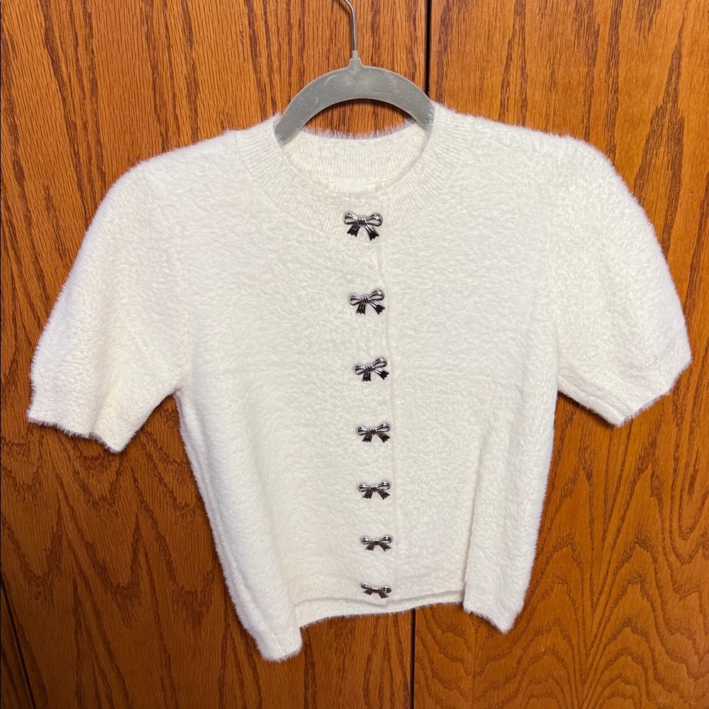 Cyrus White Short Sleeve Cardigan with Black Bows